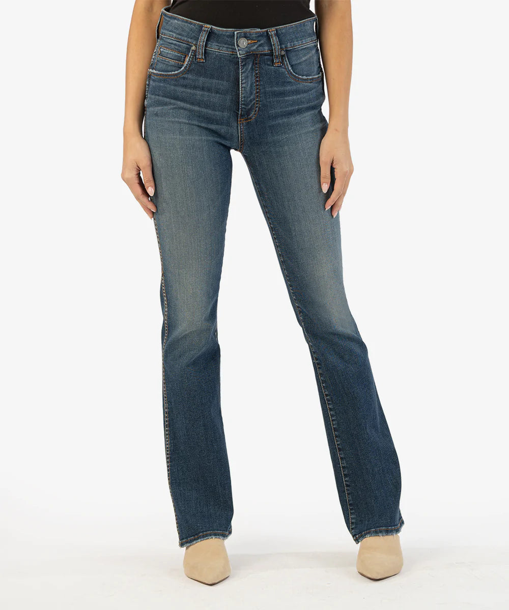 Model wearing Kut From The Kloth - Natalie High Rise Fab Ab Bootcut KP1235MB8 in Allied Wash.