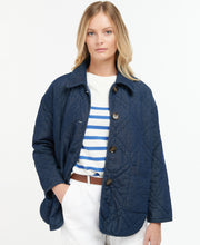 Load image into Gallery viewer, Model wearing Barbour Denim Barrhead Quilt in Dark Was/Dress Indigo.
