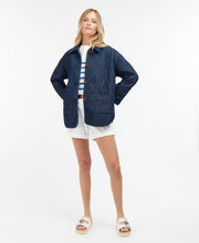 Load image into Gallery viewer, Model wearing Barbour Denim Barrhead Quilt in Dark Was/Dress Indigo.
