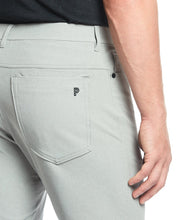 Load image into Gallery viewer, Model wearing Public Rec Workday Pant straight leg in fog.
