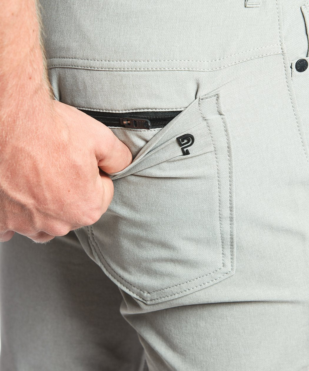 Model wearing Public Rec Workday Pant straight leg in fog.