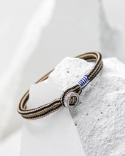 Load image into Gallery viewer, Pig &amp; Hen Don Dino bracelet in navy / sand with silver ring.
