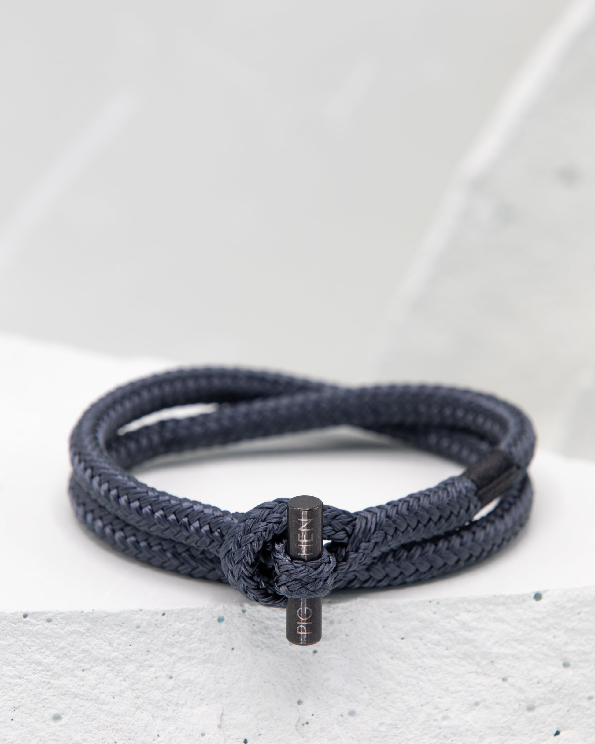 Pig & Hen Tiny Ted slate gray with black buckle bracelet.