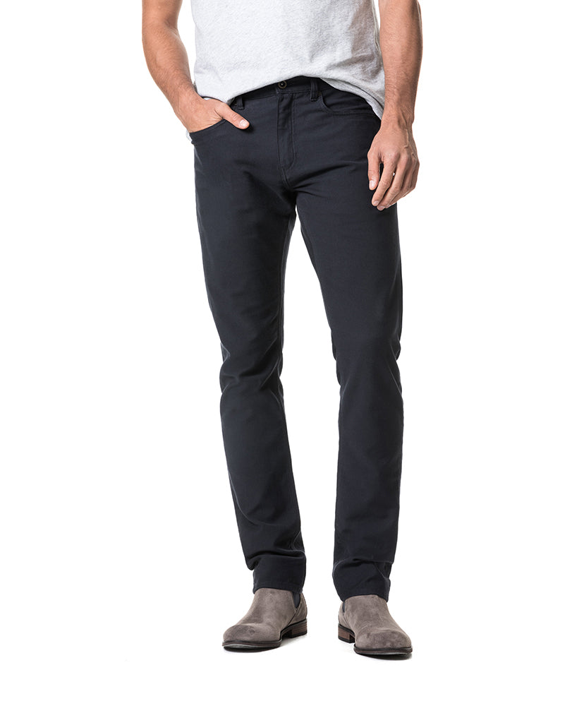 Model wearing Rodd & Gunn Motion 2 Straight Jean RL Navy.