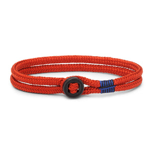 Pig & Hen Don Dino bracelet in coral red with black ring.