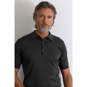 Model wearing John Smedley - Adrian S/S Polo Shirt in Granite.