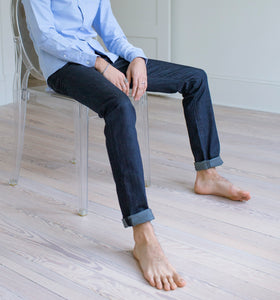 Model wearing Raleigh Denim Jones Resin Rinse jeans.
