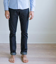 Load image into Gallery viewer, Model wearing Raleigh Denim Jones Resin Rinse jeans.
