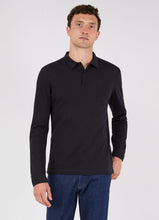 Load image into Gallery viewer, Model wearing Sunspel - Cotton Riviera LS Polo Shirt in Black.
