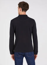 Load image into Gallery viewer, Model wearing Sunspel - Cotton Riviera LS Polo Shirt in Black - back.
