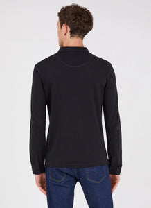 Model wearing Sunspel - Cotton Riviera LS Polo Shirt in Black - back.