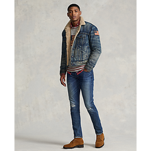 Load image into Gallery viewer, Model wearing Polo Ralph Lauren Denim Sherpa Trucker Jacket in Earlton.

