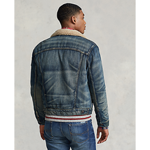 Load image into Gallery viewer, Model wearing Polo Ralph Lauren Denim Sherpa Trucker Jacket in Earlton - back.

