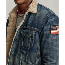Load image into Gallery viewer, Model wearing Polo Ralph Lauren Denim Sherpa Trucker Jacket in Earlton.
