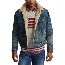 Load image into Gallery viewer, Model wearing Polo Ralph Lauren Denim Sherpa Trucker Jacket in Earlton.
