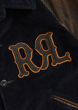 Load image into Gallery viewer, RRL - Appliqued RRL Logo Corduroy Leather-Sleeve Varsity Jacket in Black/Deep Navy.

